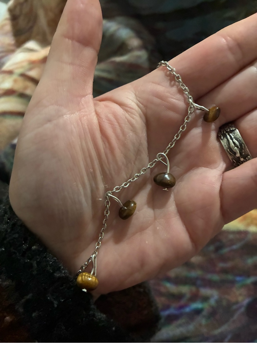 Silver tone bracelet with tiger eye gemstone beads